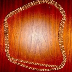 Gold chain(not real gold), clean looking and easy to clean.